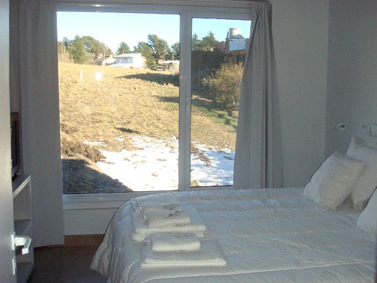 img/inmuebles/dormitorio_con_nieve-1.gif